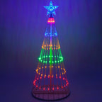 Multicolour outdoor Christmas tree LED lightshow with illuminated star topper