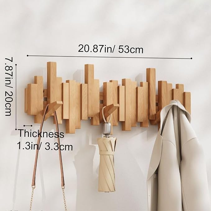 Wall-mounted wooden coat rack with staggered folding hooks