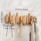 Wall-mounted wooden coat rack with staggered folding hooks