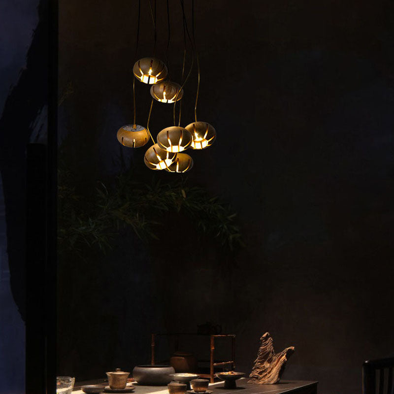 Cluster multi-light chandelier with suspended wood-effect pendant shades