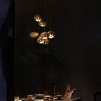 Cluster multi-light chandelier with suspended wood-effect pendant shades