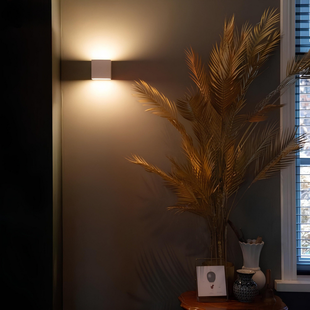 Geometric LED wall lamp with motion sensor and up-and-down lighting