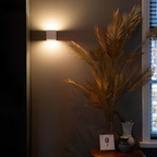 Geometric LED wall lamp with motion sensor and up-and-down lighting