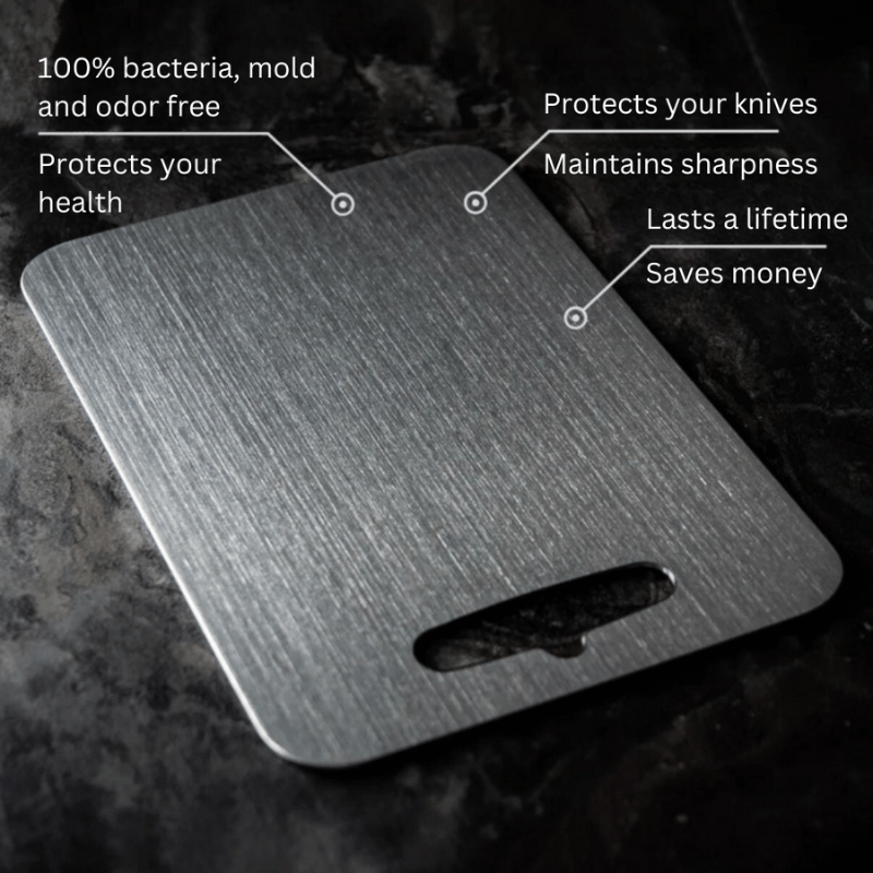 Three grey metal cutting boards with rounded corners and hanging handles