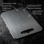 Three grey metal cutting boards with rounded corners and hanging handles