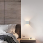 Geometric LED wall lamp with motion sensor and up-and-down lighting