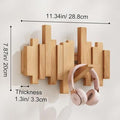 Wall-mounted wooden coat rack with staggered folding hooks