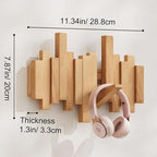 Wall-mounted wooden coat rack with staggered folding hooks