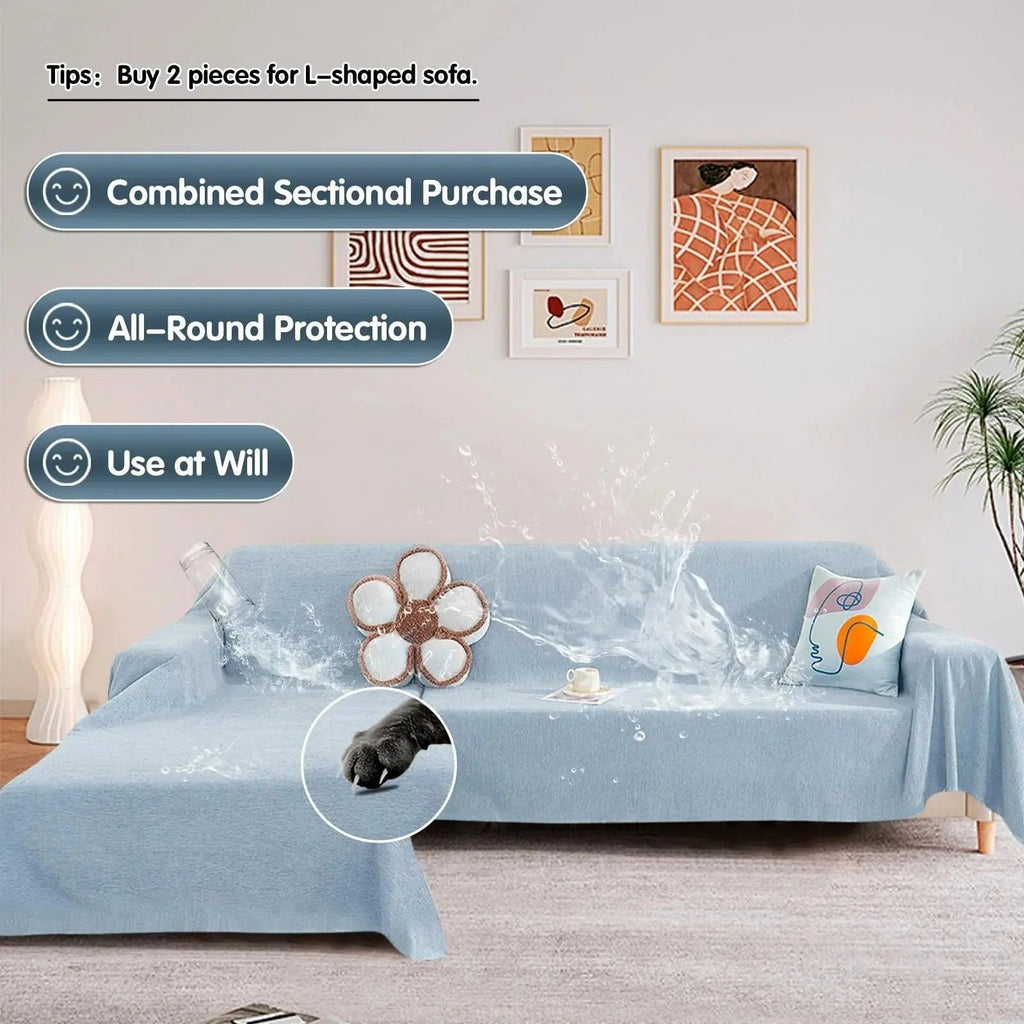 Light blue waterproof sofa cover draped over a sofa