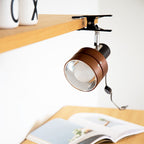 Round wood-effect clip table lamp with metal clamp