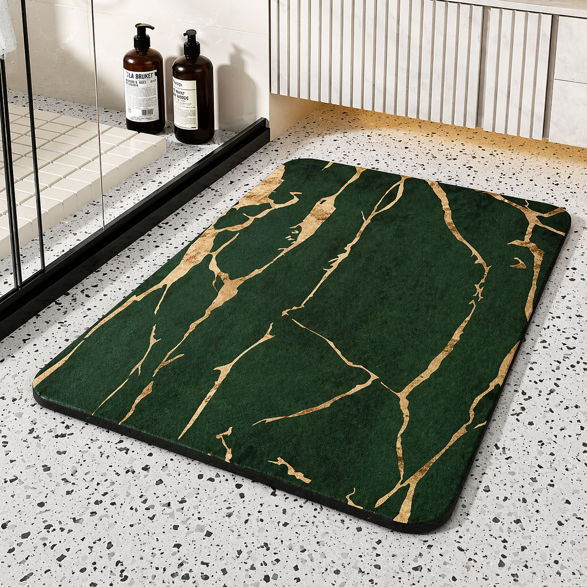 Black rectangular bathroom mat with white marble-effect veining and rounded corners