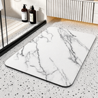 Black rectangular bathroom mat with white marble-effect veining and rounded corners