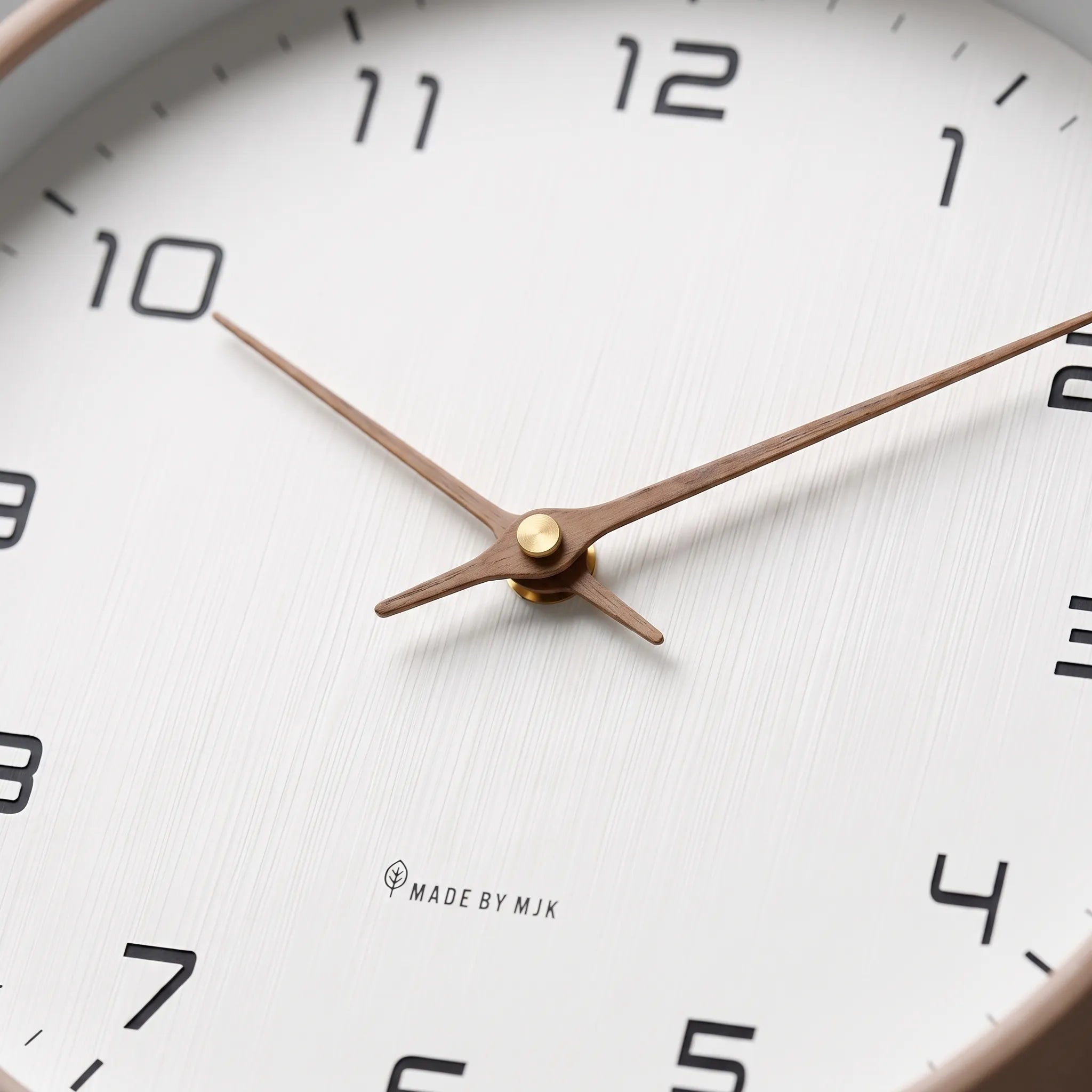 Clarix  - Modern Minimalist Round Wall Clock Checking The Time