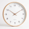 Clarix  - Modern Minimalist Round Wall Clock Checking The Time