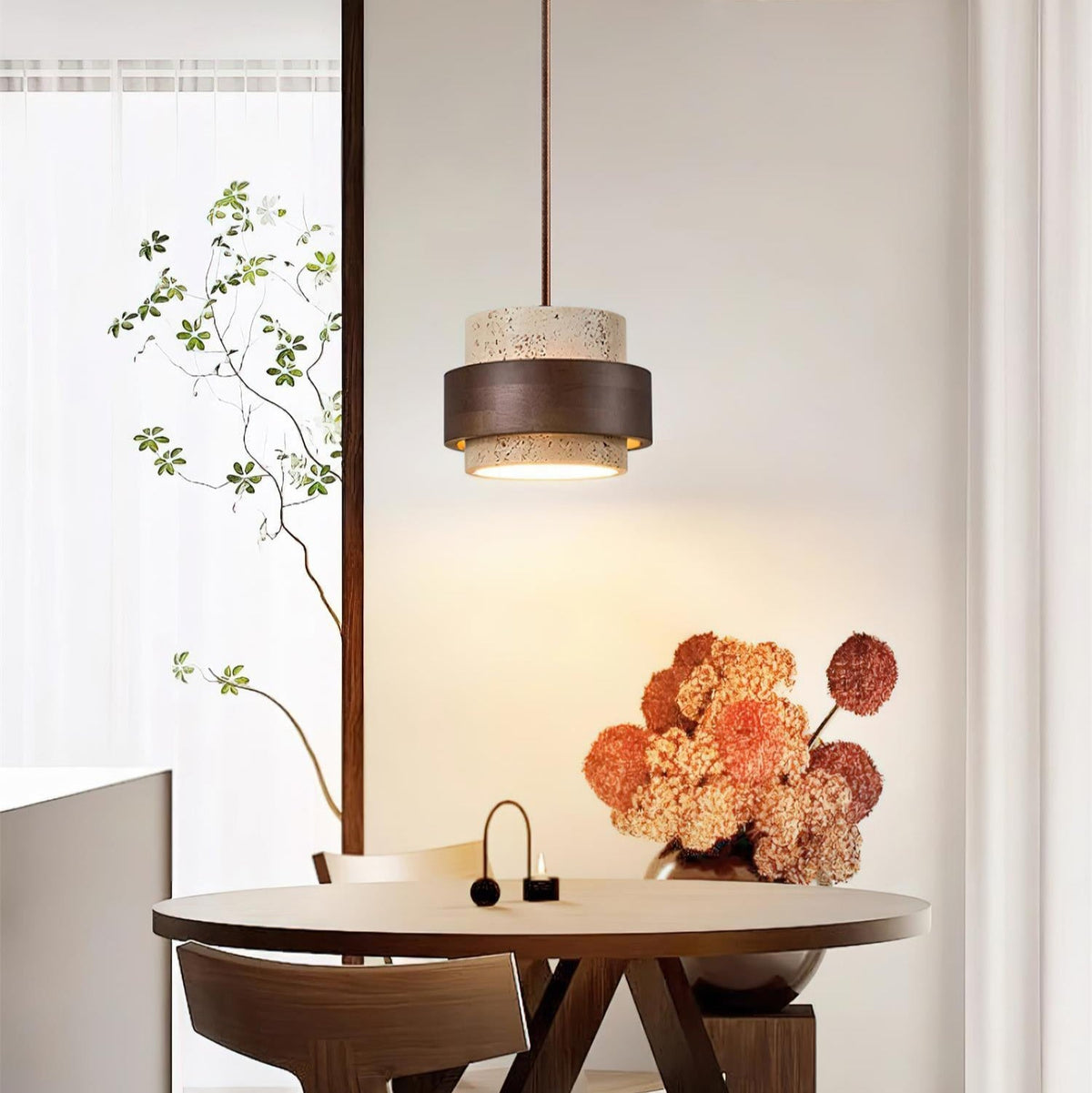 Pendant light with textured travertine shade and brown outer band