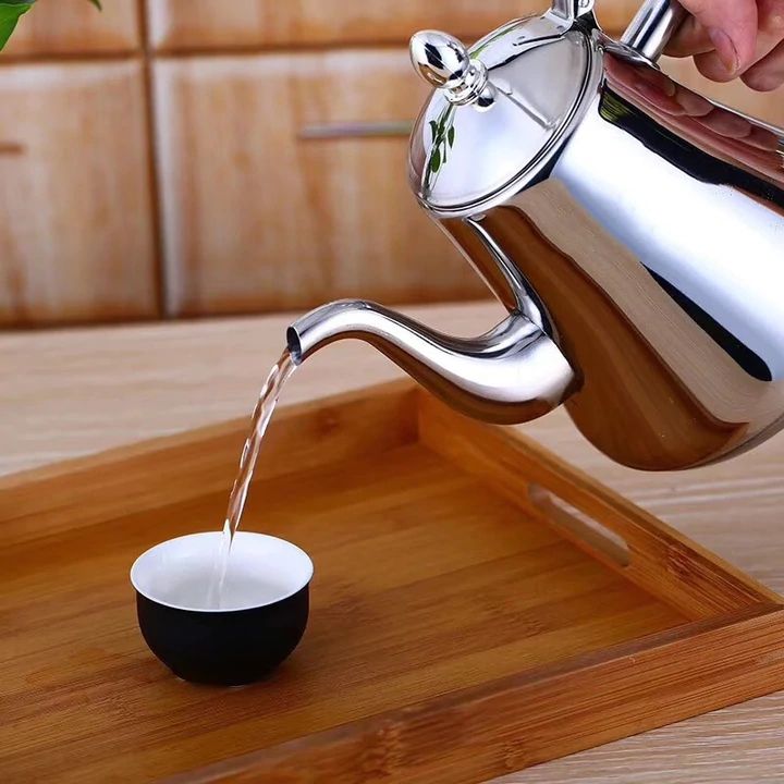 Lidded induction stovetop kettle with curved spout and raised handle