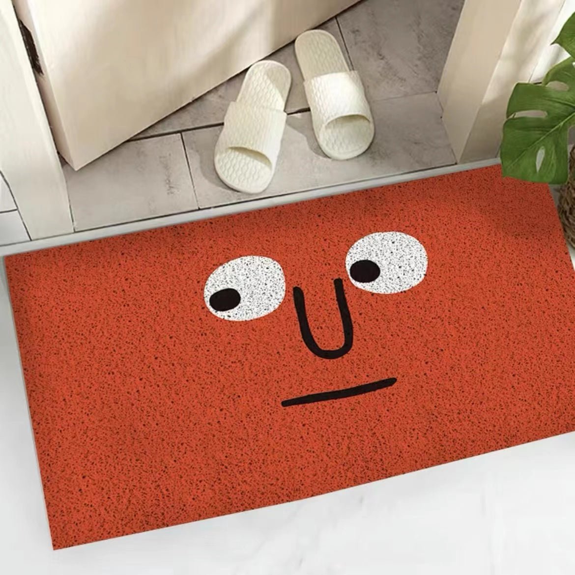 Orange rectangular emoji face welcome doormat