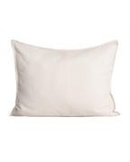 Cream muslin pillowcase with a softly crinkled texture and finished edges