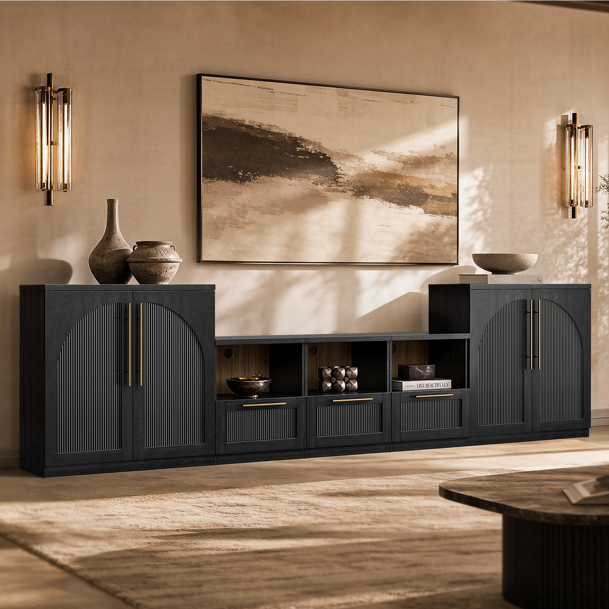 Black arched accent cabinet with fluted double doors and gold-tone handles