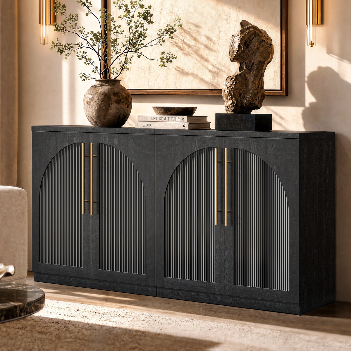 Black arched accent cabinet with fluted double doors and gold-tone handles