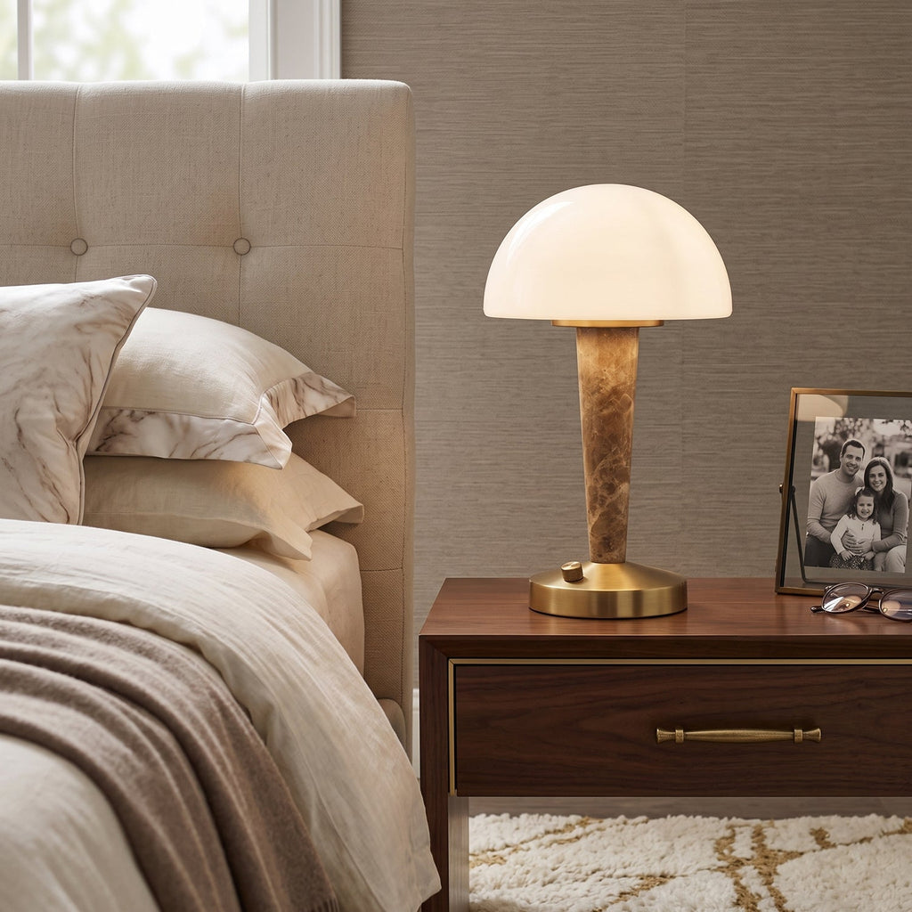 Table lamp with white dome shade, gold base and marble-effect stem