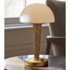 Table lamp with white dome shade, gold base and marble-effect stem