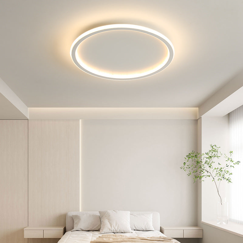 Round LED ceiling light with a circular illuminated ring