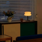 Glass table lamp with double oval shade and chrome-finish base
