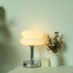 Glass table lamp with double oval shade and chrome-finish base