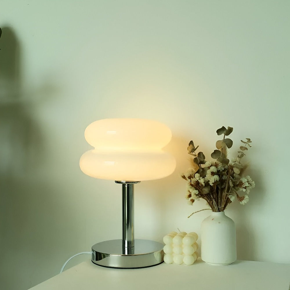 Glass table lamp with double oval shade and chrome-finish base