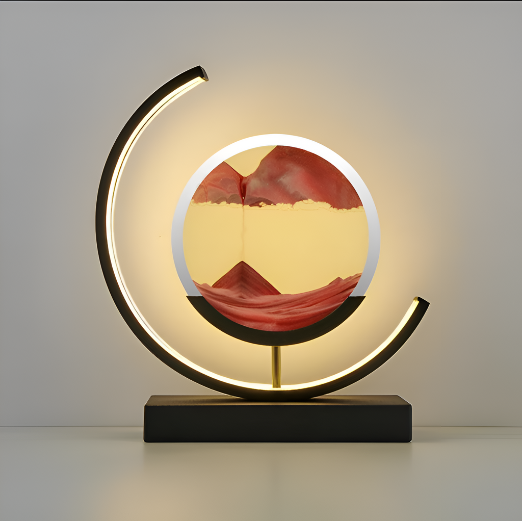 Decorative circular table lamp with sand art display and illuminated frame