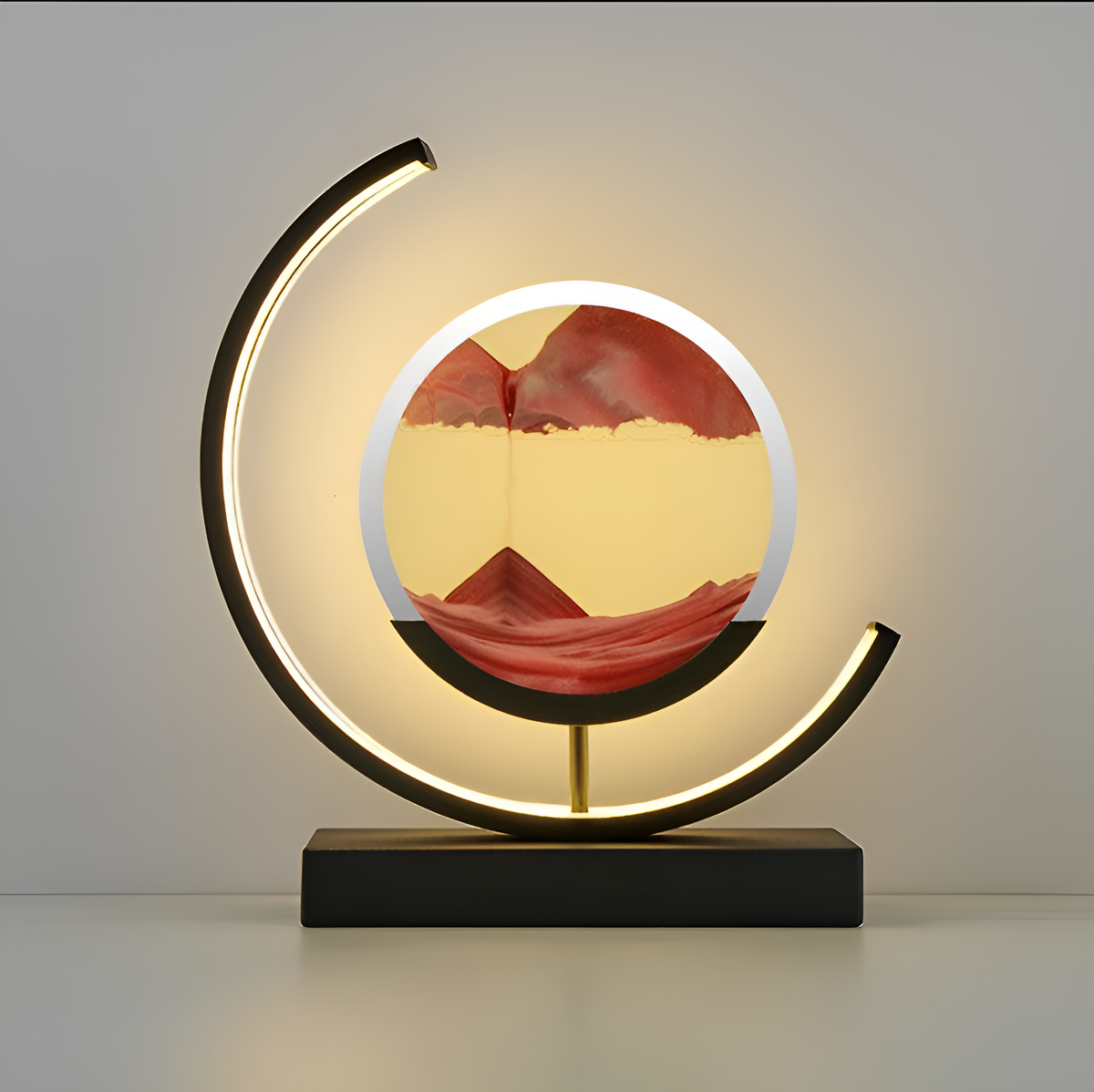 Decorative circular table lamp with sand art display and illuminated frame