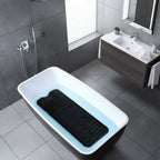 Textured non-slip bath mat with suction cups inside a bath