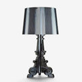 Baroque-inspired table lamp with ribbed shade and ornate scroll base