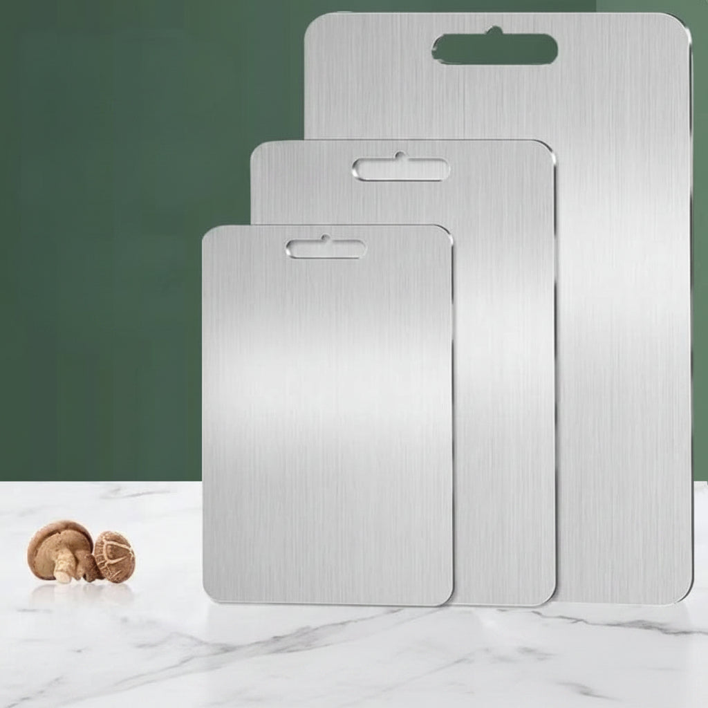 Rectangular silver cutting board with integrated handle opening