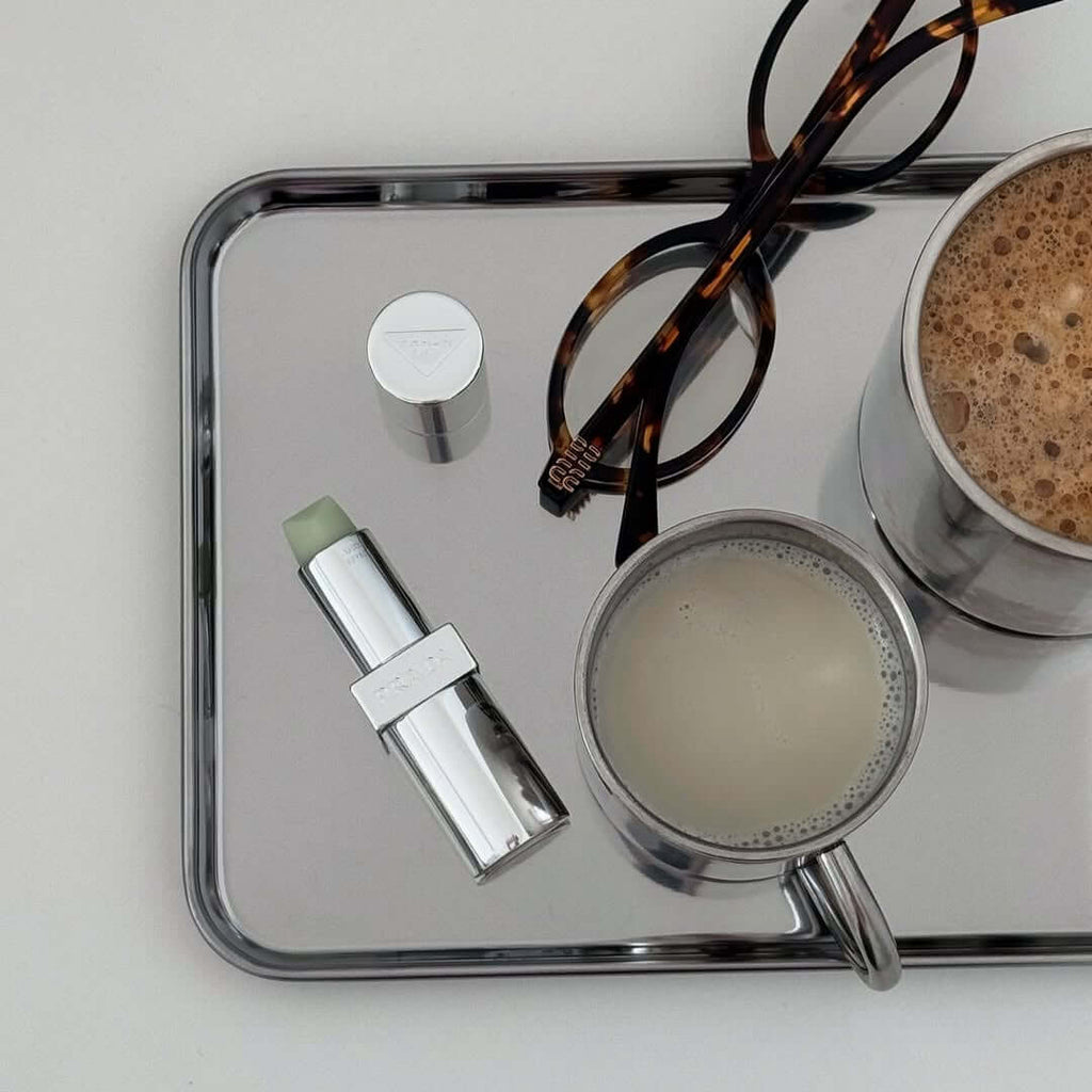 Rectangular stainless steel serving tray with raised edge