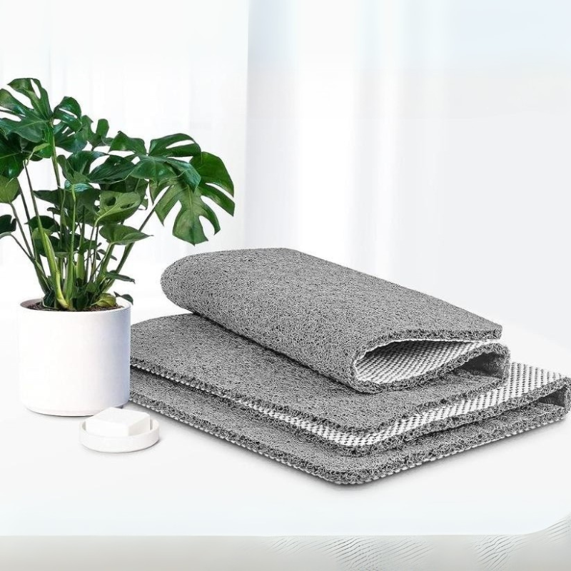 Textured non-slip bathroom mat beside a shower