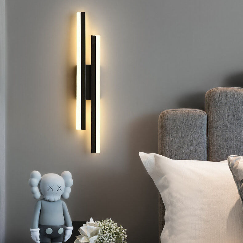 Linear LED wall sconce with two vertical illuminated bars