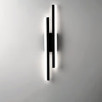 Linear LED wall sconce with two vertical illuminated bars