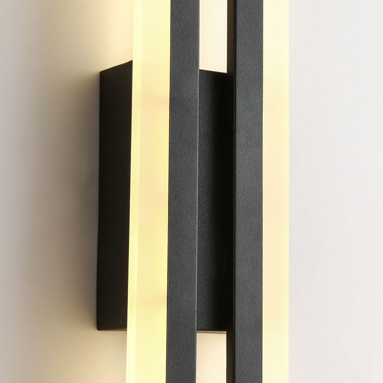 Linear LED wall sconce with two vertical illuminated bars