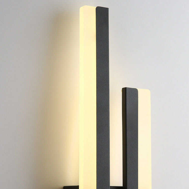 Linear LED wall sconce with two vertical illuminated bars