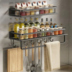 Black wall-mounted kitchen storage shelf with towel holder and hooks