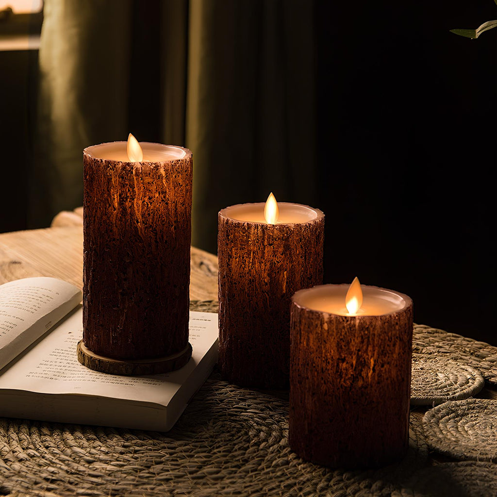 LED flameless candles with flickering flame-shaped lights in pillar and pumpkin-inspired designs