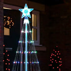 Multicolour outdoor Christmas tree LED lightshow with illuminated star topper