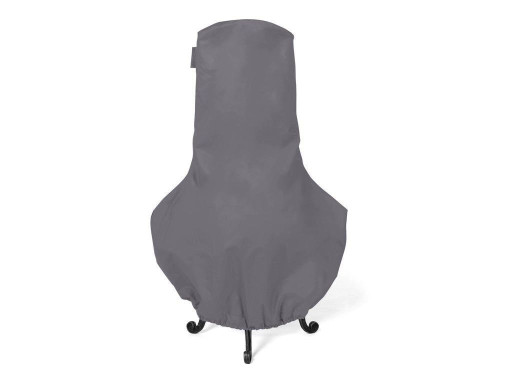 Charcoal cover fitted over a shaped outdoor chiminea