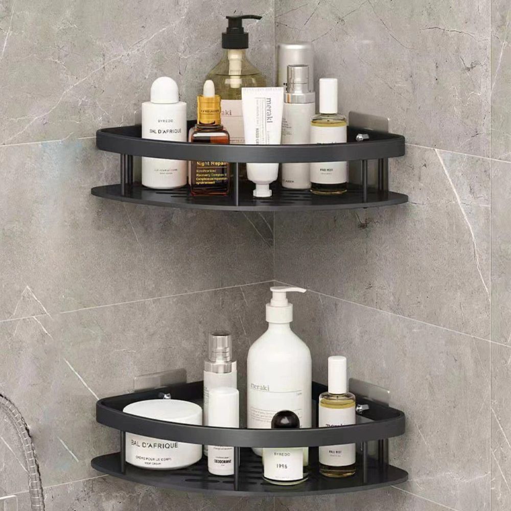 Two-tier corner shower shelf in black and silver with adhesive wall mounts