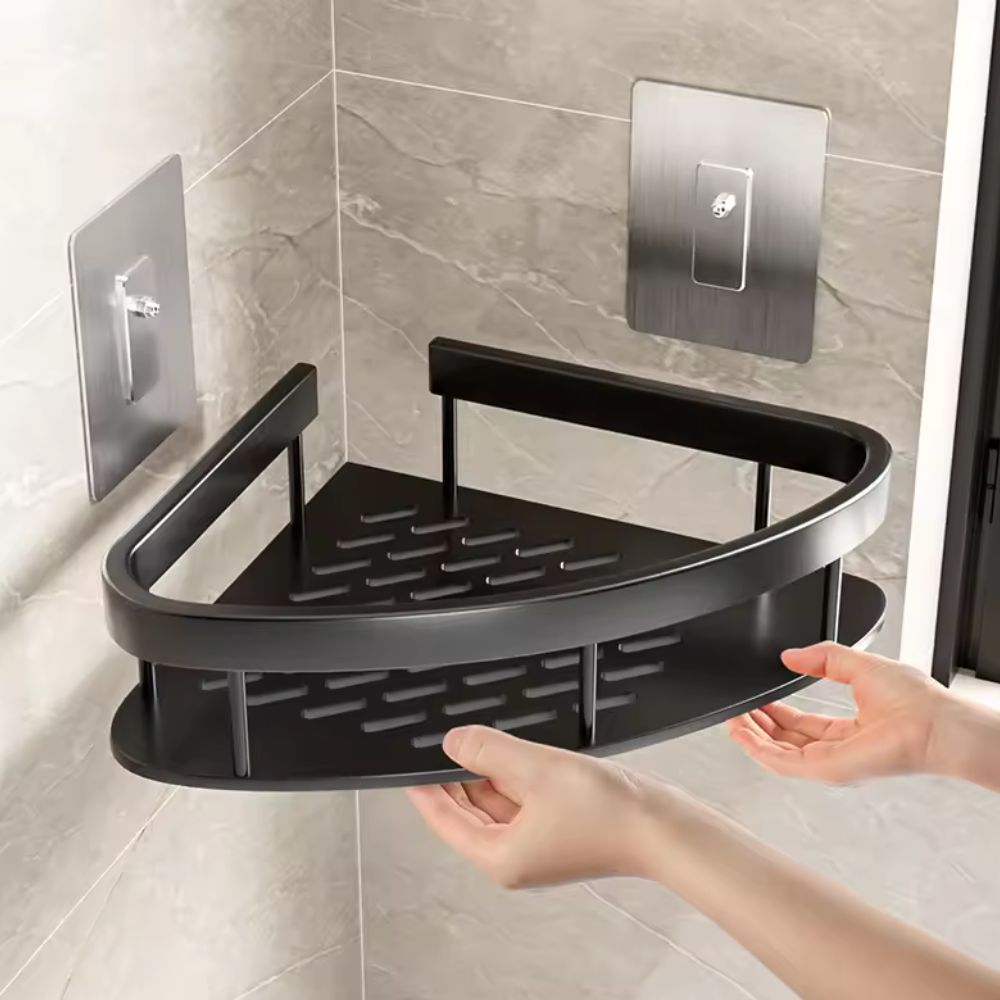 Two-tier corner shower shelf in black and silver with adhesive wall mounts