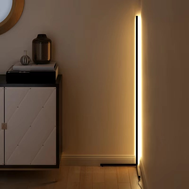 Slim dimmable LED floor lamp with vertical light bar and freestanding base