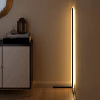 Slim dimmable LED floor lamp with vertical light bar and freestanding base