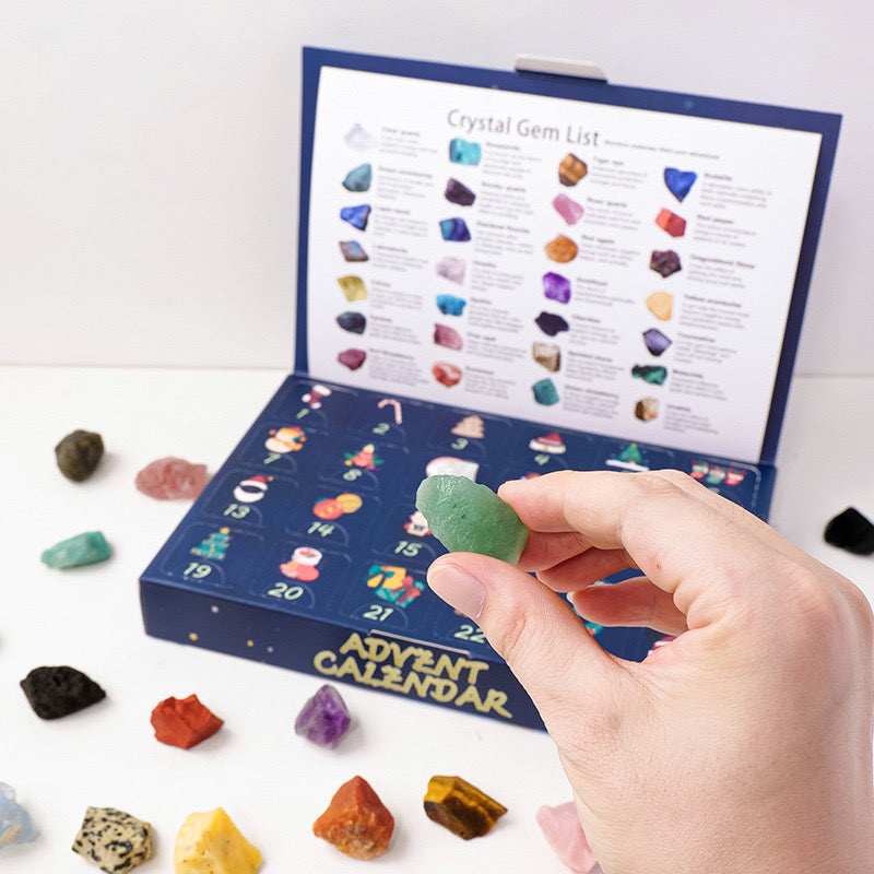 Blue crystal gem advent calendar with 24 numbered compartments and gemstone guide